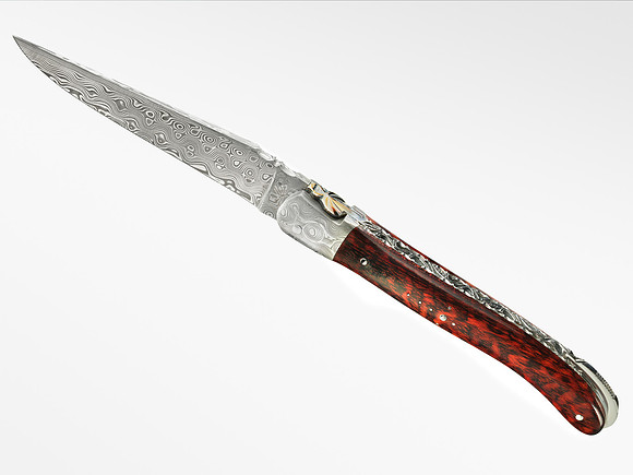 Amourette handle and rose Damasteel blade.